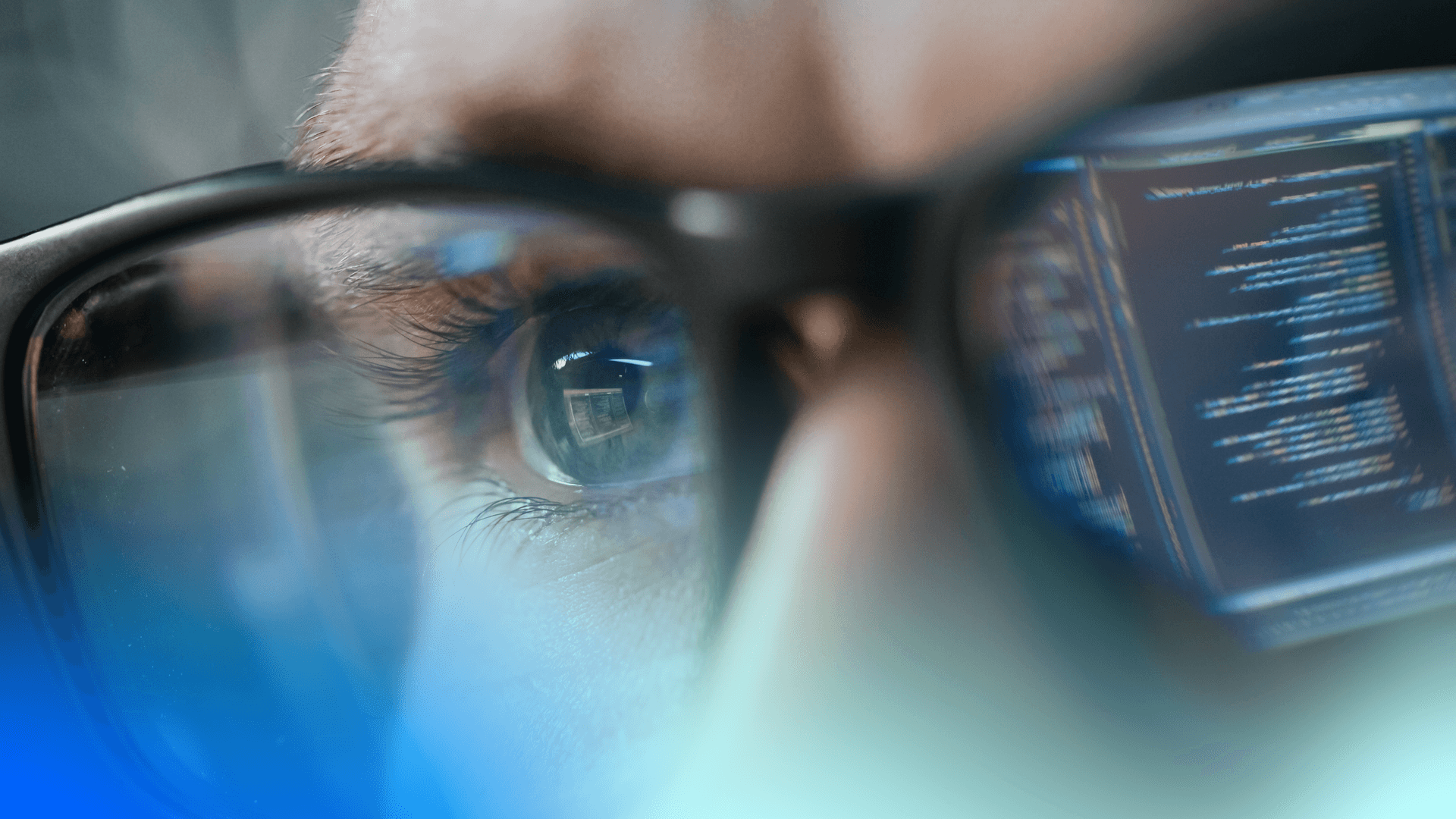 Java application engineer with Java legacy code reflecting in his glasses